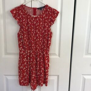 One Clothing Floral zipper back Romper with pockets Size Lg. PTP 19” Length 29”